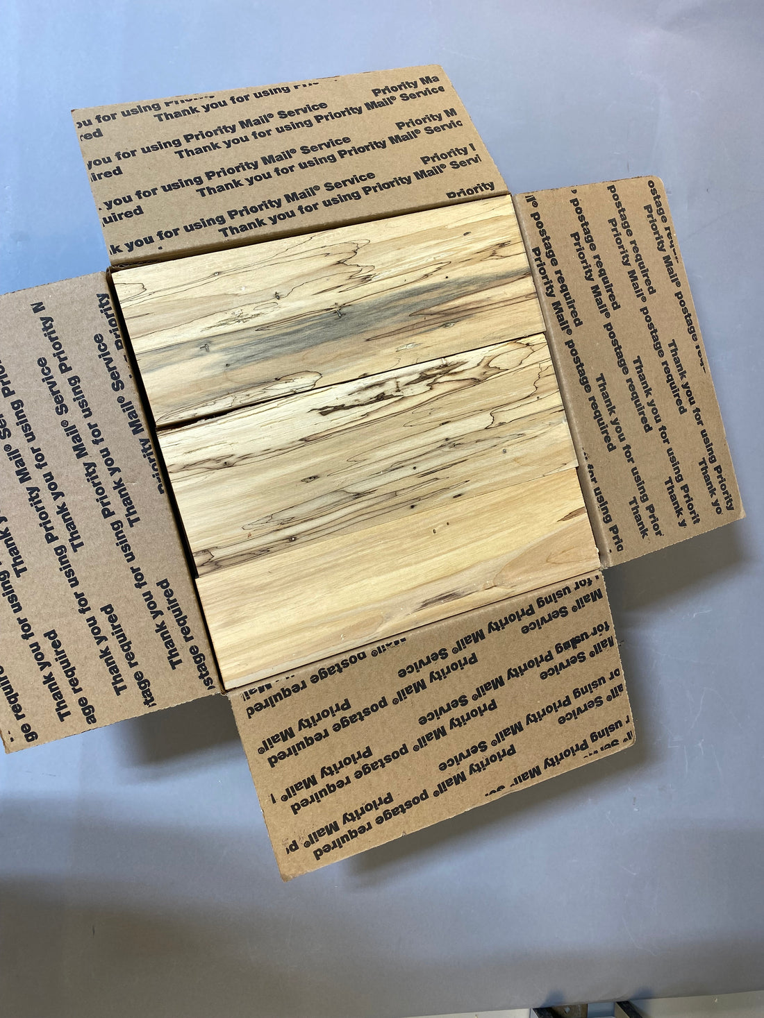 8/4 mixed spalted maple and hickory in a large flat rate box